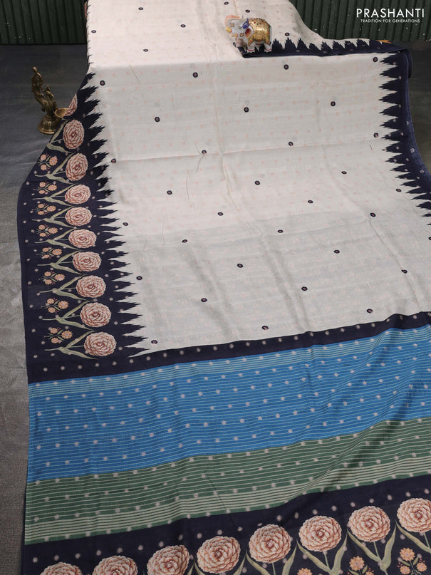 Matka tussar saree beige and blue with allover thread buttas & butta prints and long temple design printed border