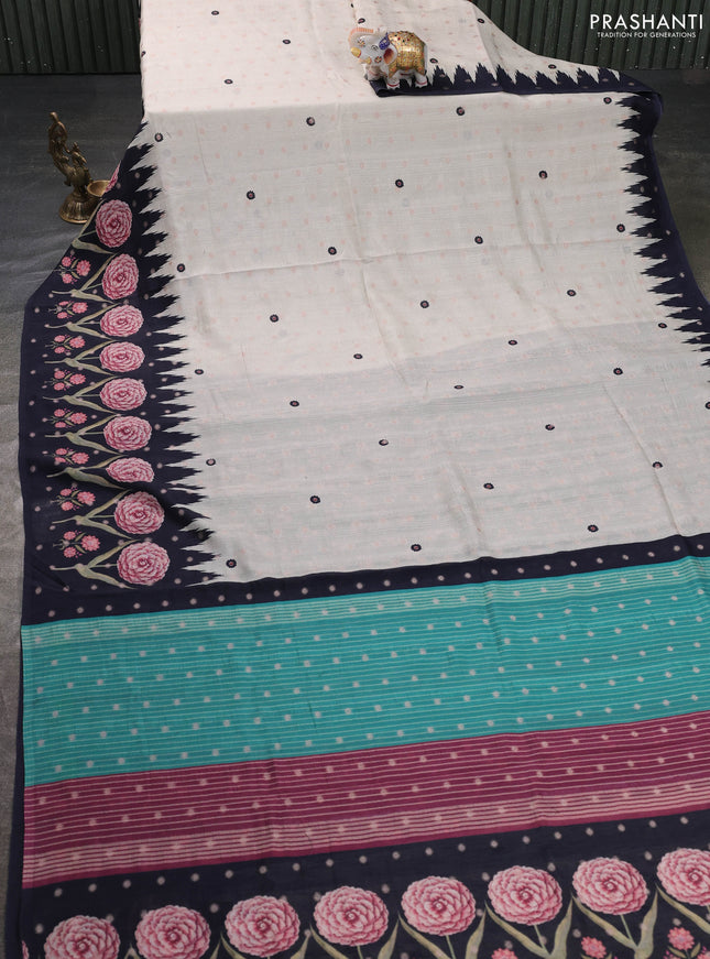 Matka tussar saree beige and teal green with allover thread buttas & butta prints and long temple design printed border