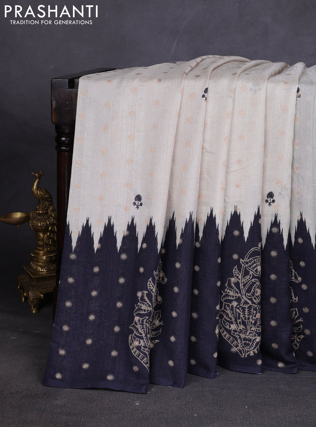 Matka tussar saree beige and black yellow with allover thread buttas & butta prints and long temple design printed border