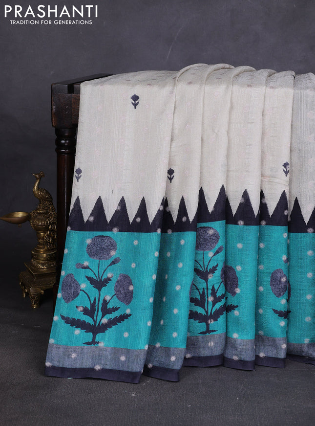 Matka tussar saree beige and teal green with allover thread buttas & butta prints and long temple design printed border