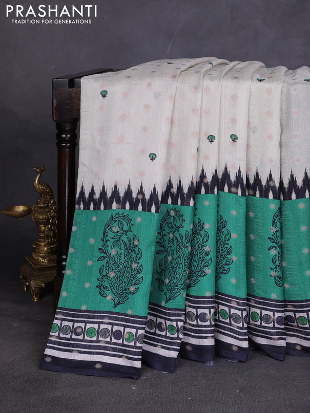 Matka tussar saree beige and teal green with allover thread buttas & butta prints and long temple design printed border