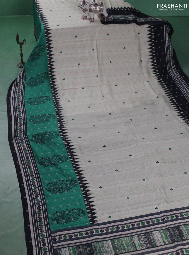 Matka tussar saree beige and teal green with allover thread buttas & butta prints and long temple design printed border