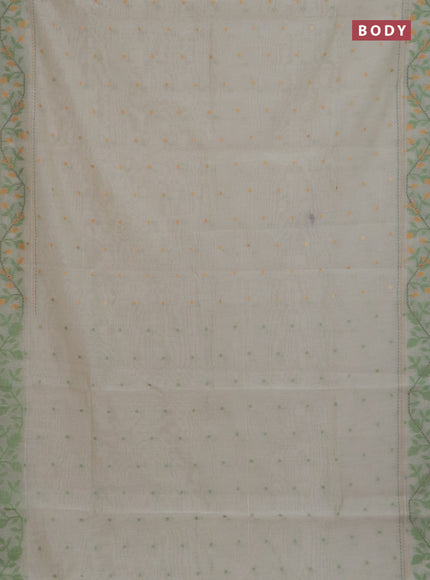 Chanderi silk cotton saree cream and light green with allover thread woven buttas and jamdhani kantha stitch work border