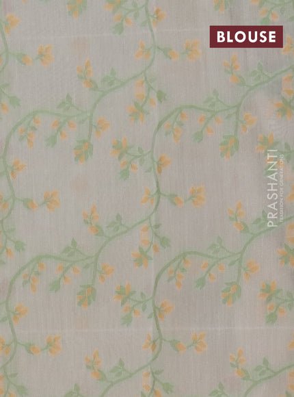 Chanderi silk cotton saree cream and light green with allover thread woven buttas and jamdhani kantha stitch work border