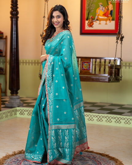 Chanderi silk cotton saree teal green and dark peach with allover thread woven buttas and jamdhani kantha stitch work border