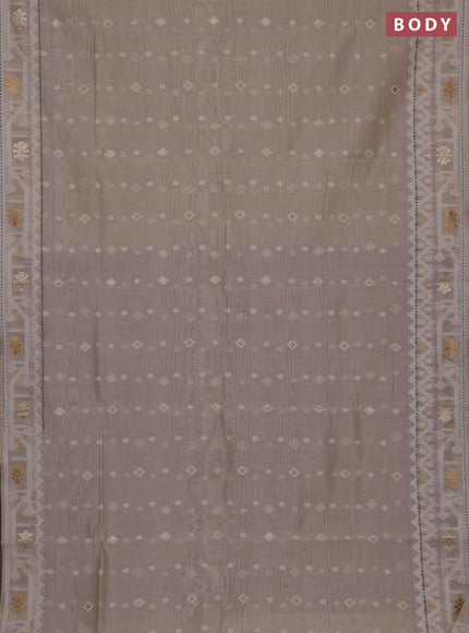 Chanderi silk cotton saree cream and mild lavender with allover thread & zari woven buttas and jamdhani kantha stitch work border