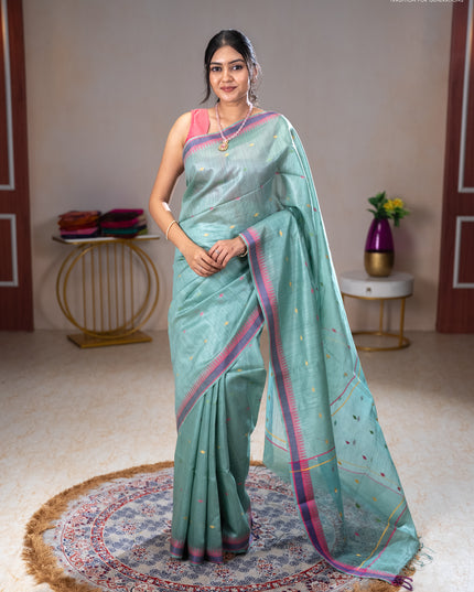 Munga tussar silk saree pastel green shade and pink with thread woven geomatric buttas and organza pallu