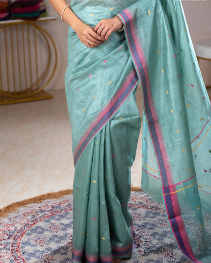 Munga tussar silk saree pastel green shade and pink with thread woven geomatric buttas and organza pallu