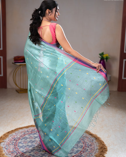 Munga tussar silk saree pastel green shade and pink with thread woven geomatric buttas and organza pallu