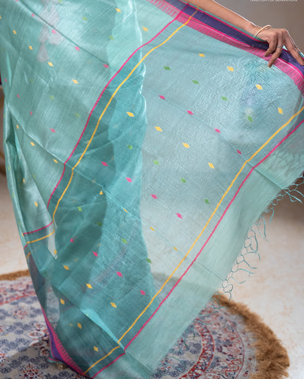 Munga tussar silk saree pastel green shade and pink with thread woven geomatric buttas and organza pallu
