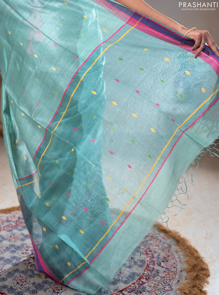 Munga tussar silk saree pastel green shade and pink with thread woven geomatric buttas and organza pallu
