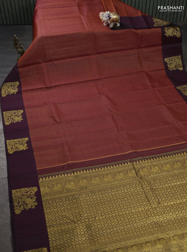 Pure kanchipuram silk saree rust shade and wine shade with allover small zari woven checked pattern and rich zari woven butta border