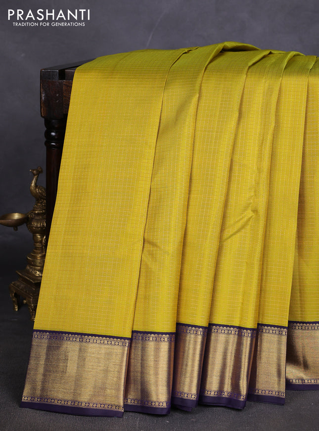 Pure kanchipuram silk saree lime yellow and dark blue with allover small zari woven checked pattern and rich zari woven border