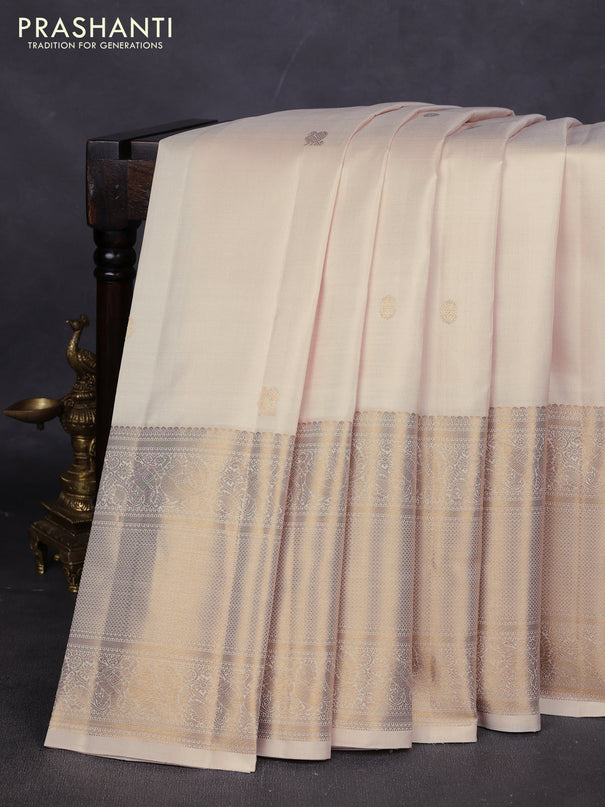 Pure kanchipuram silk saree cream with annam & rudhraksha zari woven buttas and long zari woven border