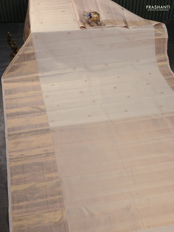 Pure kanchipuram silk saree cream with annam & rudhraksha zari woven buttas and long zari woven border