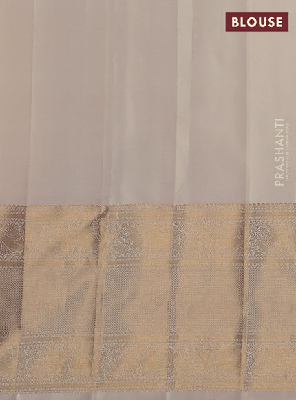 Pure kanchipuram silk saree cream with annam & rudhraksha zari woven buttas and long zari woven border