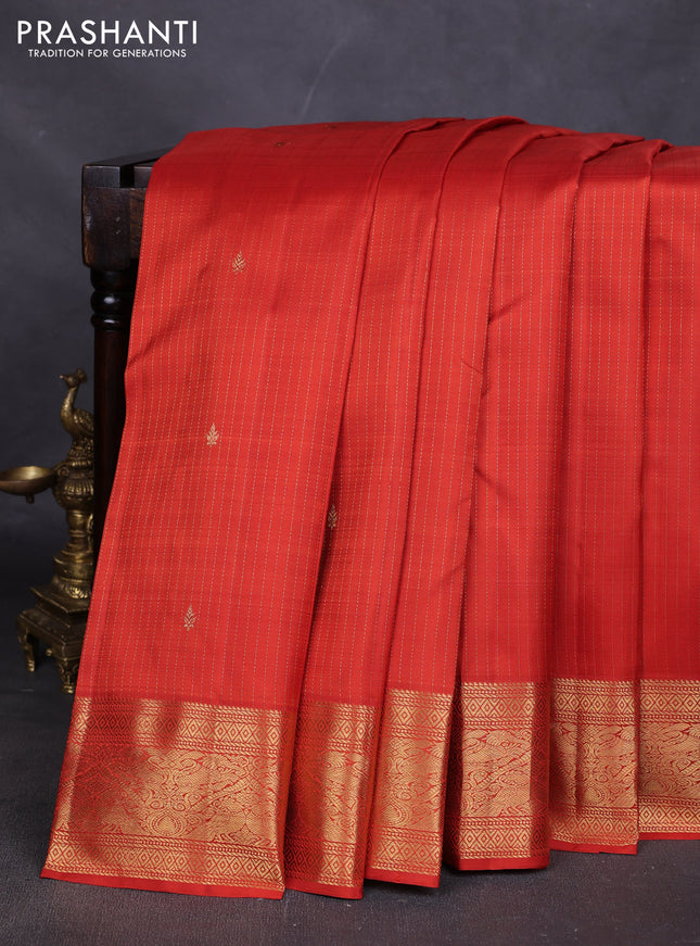 Pure kanchipuram silk saree rustic orange with allover zari weaves and rich zari woven border