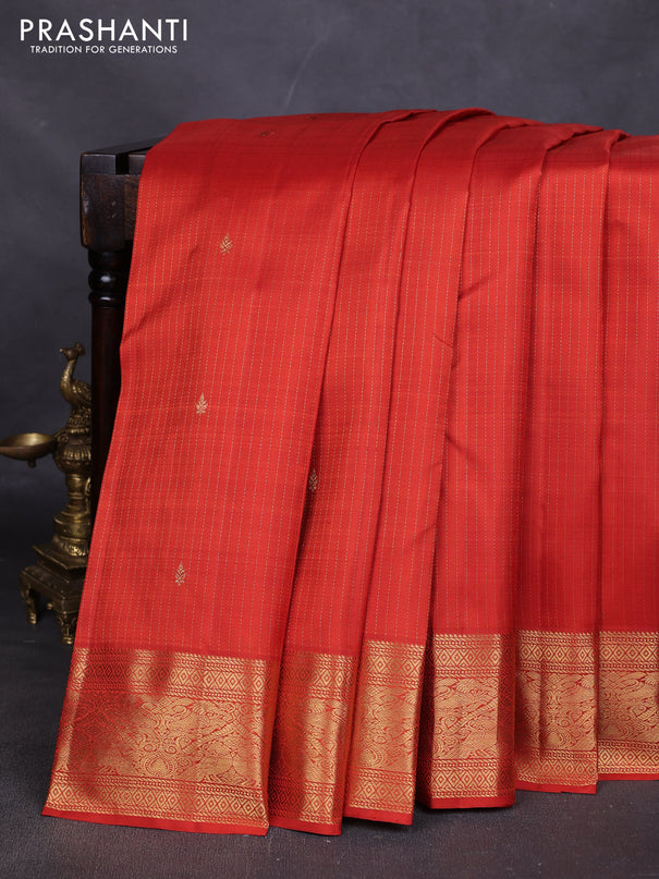 Pure kanchipuram silk saree rustic orange with allover zari weaves and rich zari woven border