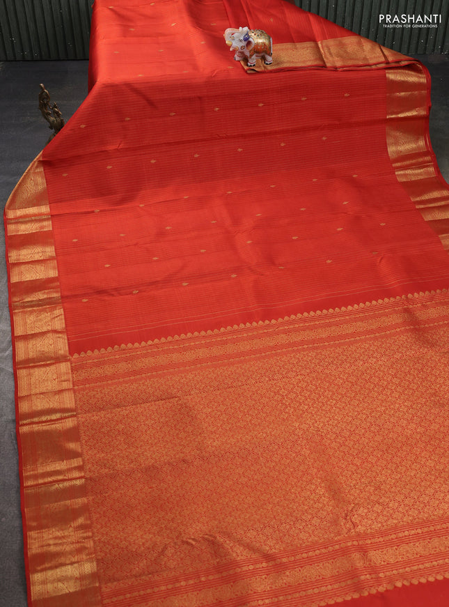 Pure kanchipuram silk saree rustic orange with allover zari weaves and rich zari woven border