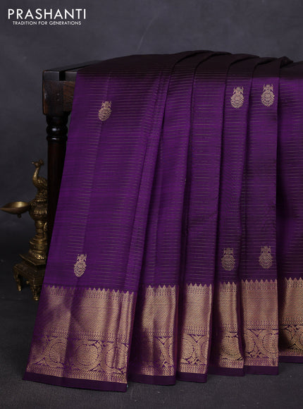 Pure kanchipuram silk saree violet with allover zari stripes & buttas and rich zari woven border