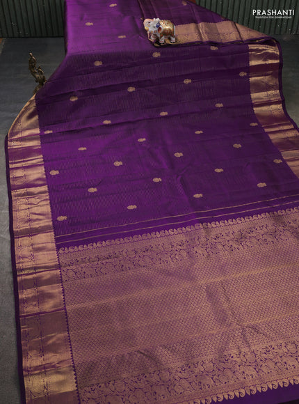 Pure kanchipuram silk saree violet with allover zari stripes & buttas and rich zari woven border