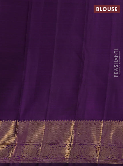 Pure kanchipuram silk saree violet with allover zari stripes & buttas and rich zari woven border