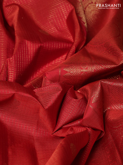 Pure kanchipuram silk saree rustic orange with allover small zari checks & buttas and rettapet zari woven border