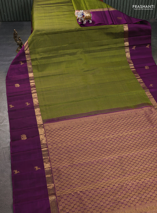 Pure kanchipuram silk saree mehendi green and purple with allover small zari woven checked pattern and long zari woven butta border