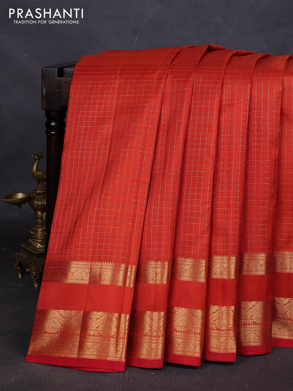 Pure kanchipuram silk saree orange with allover samll zari woven checked pattern and rettapet zari woven border