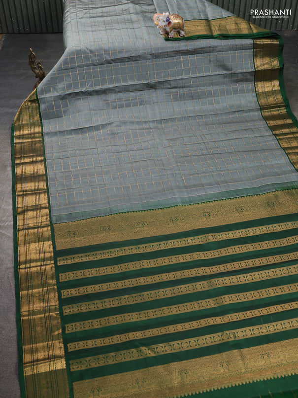 Pure kanchipuram silk saree grey and green with allover zari woven checked pattern and rich zari woven border