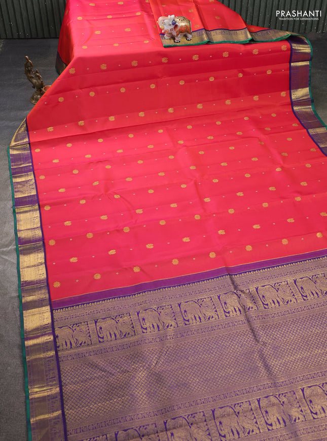 Pure kanchipuram silk saree dual shade of pinkish orange and violet with zari woven buttas and rich zari woven korvai border