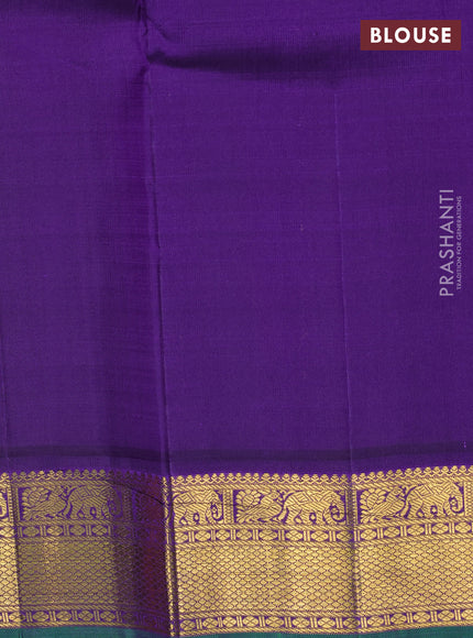 Pure kanchipuram silk saree dual shade of pinkish orange and violet with zari woven buttas and rich zari woven korvai border