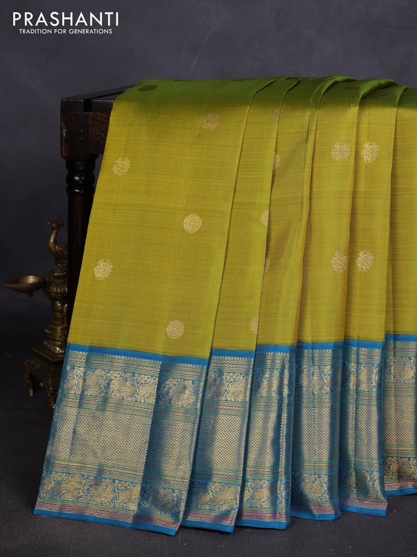 Pure kanchipuram silk saree lime green and cs blue with zari woven buttas and long zari woven border