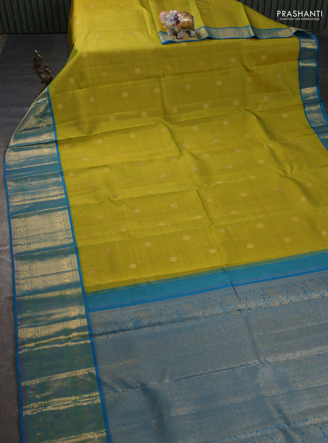 Pure kanchipuram silk saree lime green and cs blue with zari woven buttas and long zari woven border