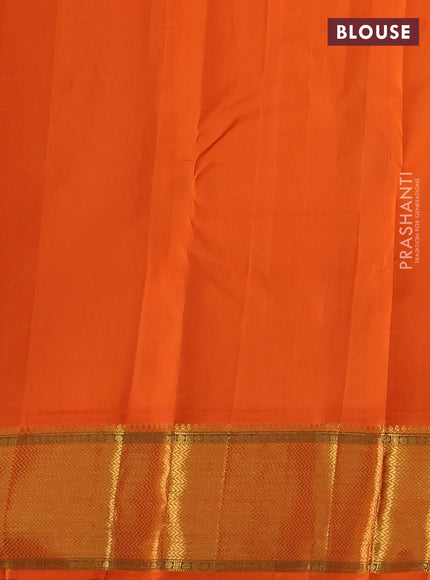 Pure kanchipuram silk saree cream and orange with zari woven buttas and rich zari woven border