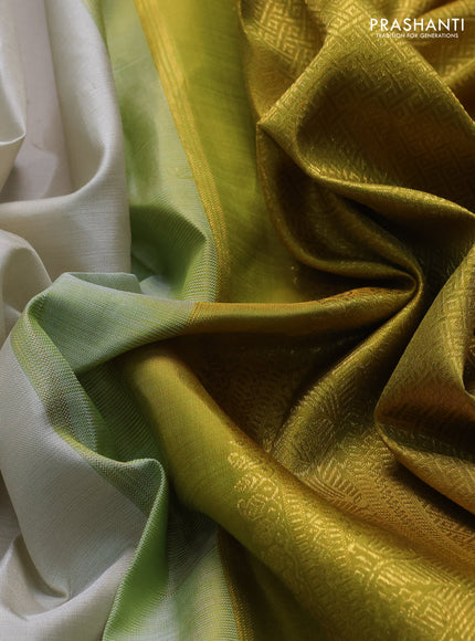 Pure kanchipuram silk saree off white and dark mustard with zari woven buttas and zari woven border