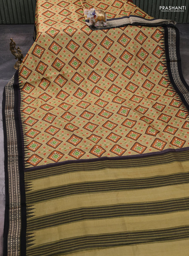 Pure tussar silk saree pista green and black with allover geomatric prints and temple design vidharbha border