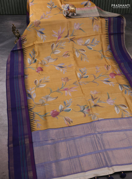 Pure tussar silk saree mustard yellow and navy blue with allover floral prints and long temple design rettapet zari woven border