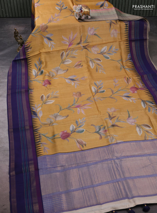 Pure tussar silk saree mustard yellow and navy blue with allover floral prints and long temple design rettapet zari woven border