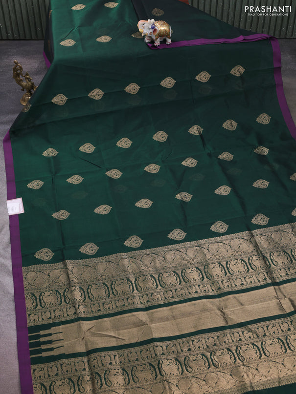 Kanchipuram silk cotton saree bottle green and purple with zari woven buttas and simple border