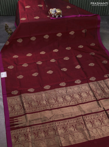 Kanchipuram silk cotton saree deep maroon and magenta pink with zari woven buttas and simple border