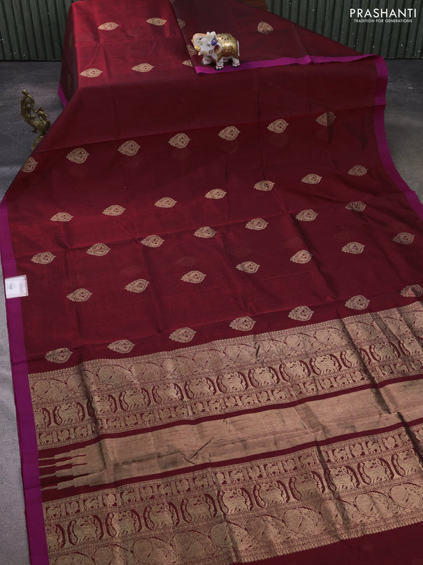 Kanchipuram silk cotton saree deep maroon and magenta pink with zari woven buttas and simple border