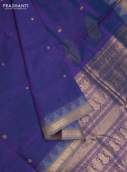 Kanchipuram silk cotton saree dual shade of greenish purple and grey with zari woven buttas and temple design zari woven border