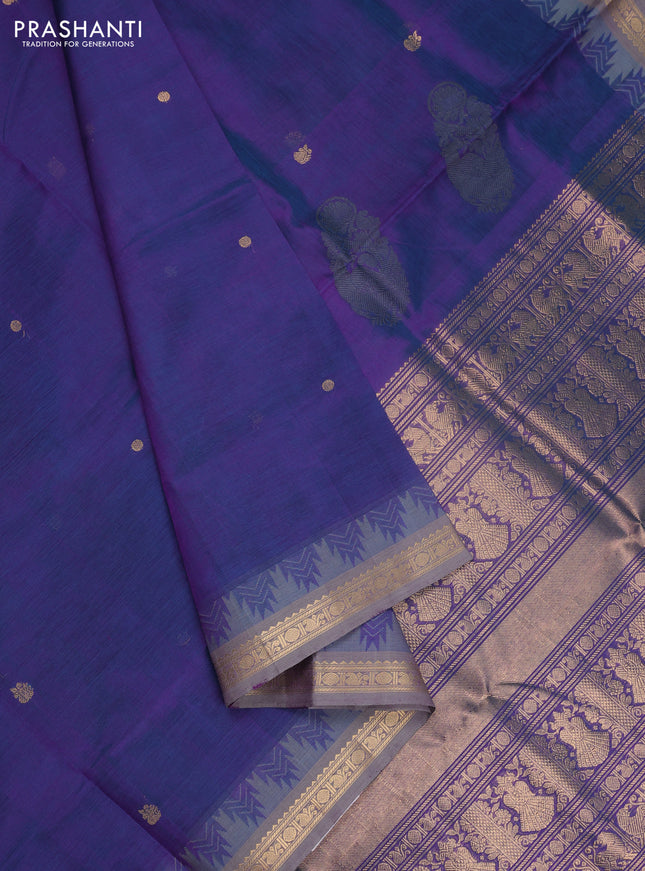 Kanchipuram silk cotton saree dual shade of greenish purple and grey with zari woven buttas and temple design zari woven border