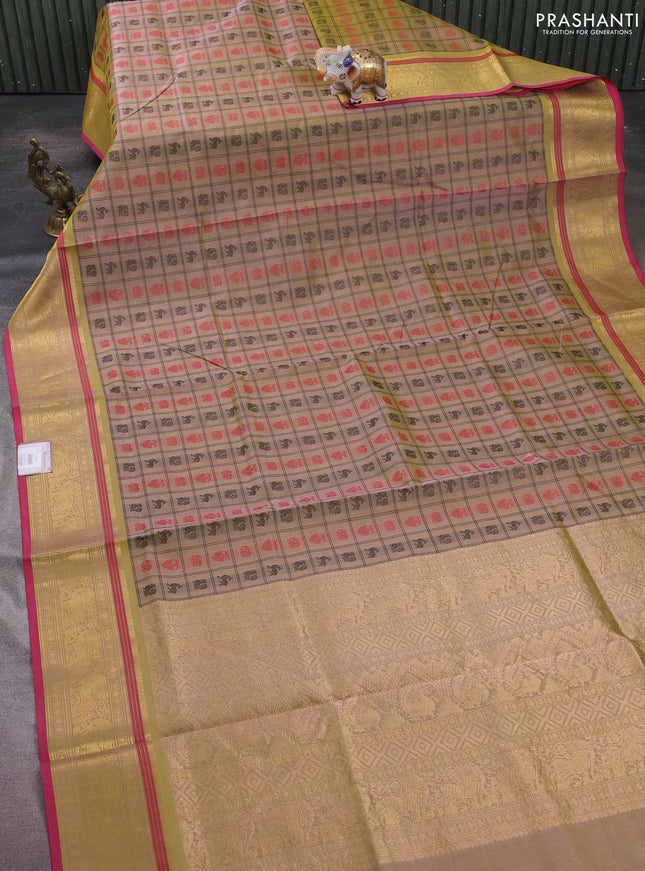 Kanchipuram silk cotton saree dual shade of beige and pink with allover thread checks & buttas and zari woven border