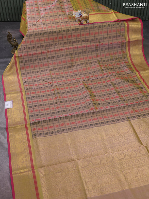 Kanchipuram silk cotton saree dual shade of beige and pink with allover thread checks & buttas and zari woven border