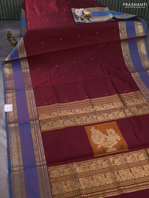 Kanchipuram silk cotton saree deep maroon and peacock blue with zari woven buttas and long rettapet zari woven border