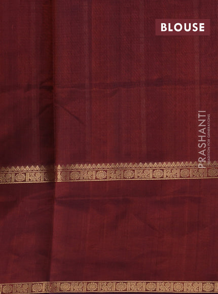 Kanchipuram silk cotton saree rust shade with allover thread checks & 1000 buttas and long rettapet zari woven border