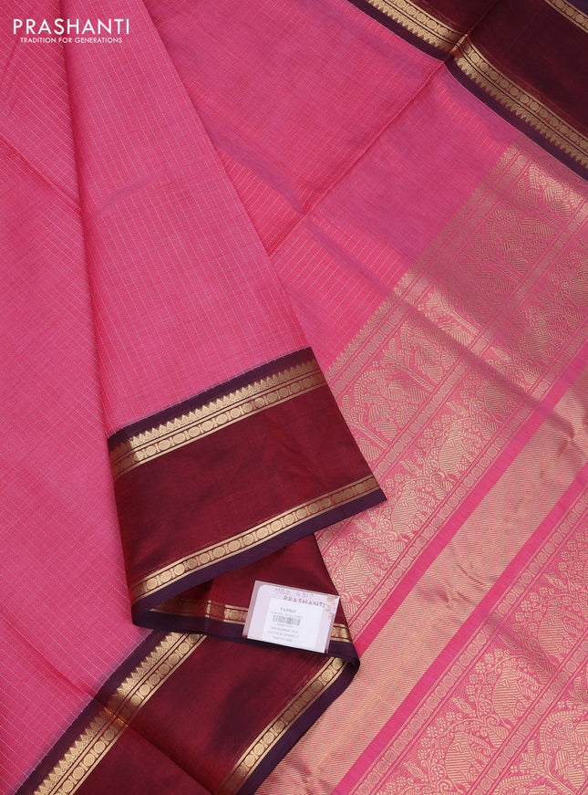 Kanchipuram silk cotton saree dual shade of red and maroon with allover zari stripe pattern and rettapet zari woven border