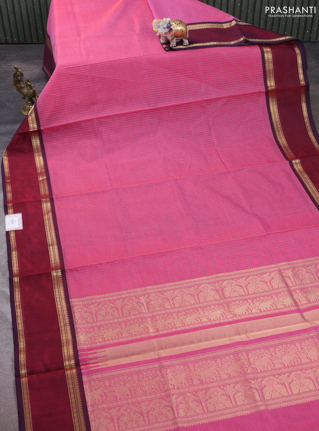 Kanchipuram silk cotton saree dual shade of red and maroon with allover zari stripe pattern and rettapet zari woven border